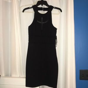 Pretty Black Dress with sheer parts NWT
